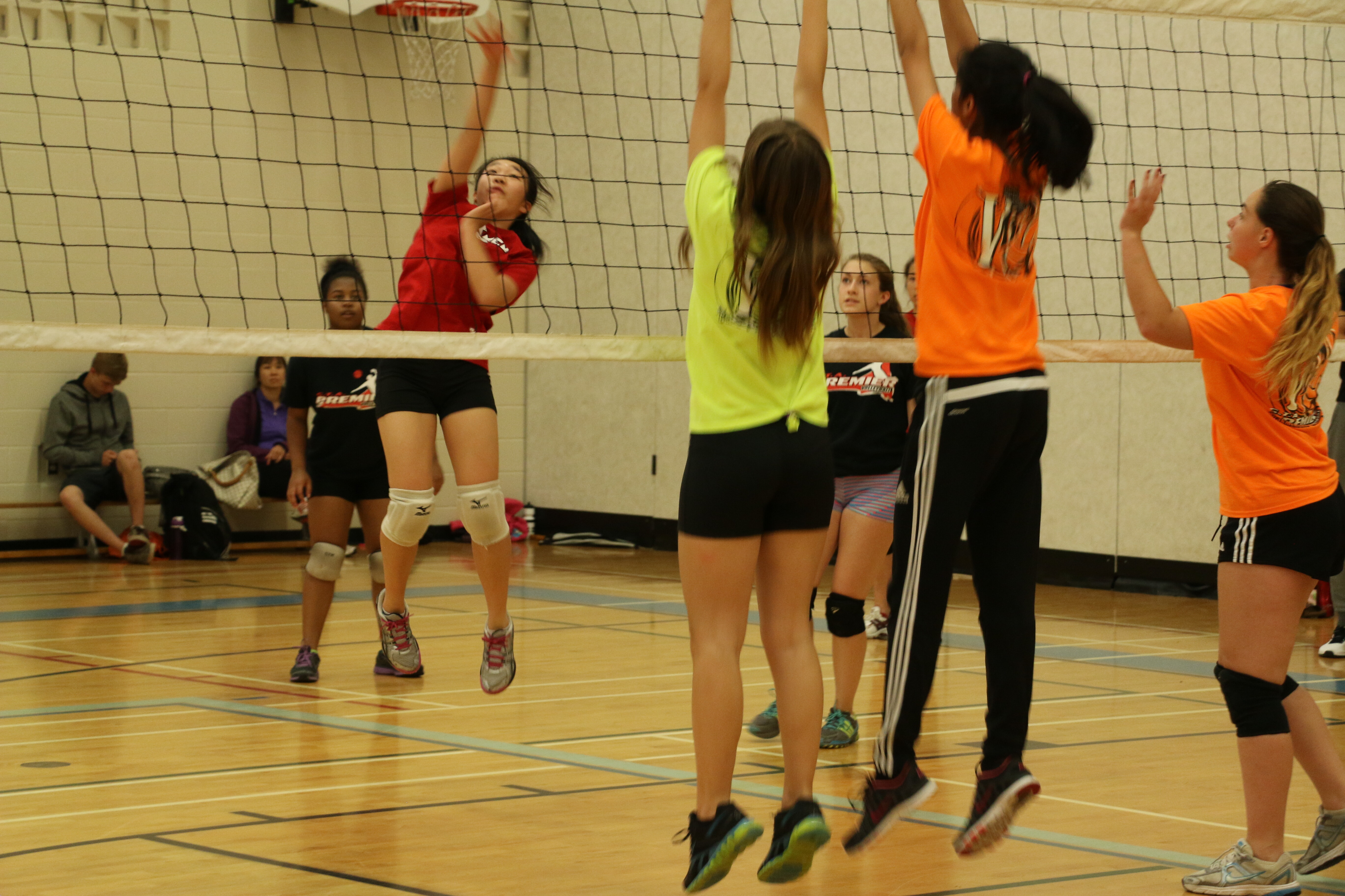 Girls playing at volleyball camp